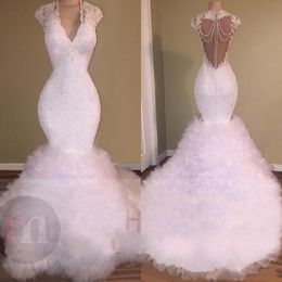 Sexy V Neck Prom Party Dresses Mermaid Appliques Beaded Crystal Backless Sweep Train Tulle Puffy Tiered Evening Gowns