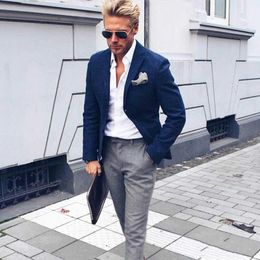 grey trousers navy jacket