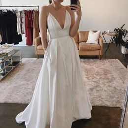 2020 Spaghetti Straps V Neck Wedding Dresses A Line Open Back Sweep Train Sleeveless Bridal Dress with Pocket Vestido De Noiva