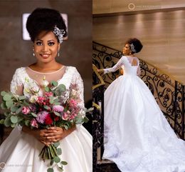 Mondern Dubai Arabic African Plus Size Ball Gown Wedding Dresses Beaded Sheer Neck Long Sleeevs Crystals Pearls Wedding Dress Bridal Gowns