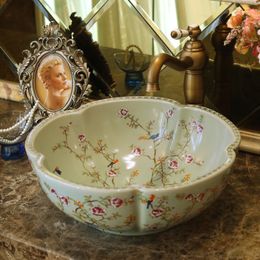 China Artistic Europe Style Counter Top porcelain wash basin bathroom sinks ceramic art hand wash basin flower and bird
