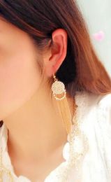 new hot Korean version of round tassel earrings female long temperament Korean earrings fashionable classic exquisite elegance