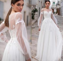 2020 Elegant Modest Lace Bohemia Wedding Dresses Sheer Jewel Neck Long Sleeves Lace Appliques A Line Wedding Bridal Gowns With Buttons