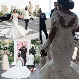 Luxury Sparkly Mermaid Wedding Dresses Plus Size Sheer Long Sleeves Crystal South African Wedding Gowns Custom Made Robe De Mariee