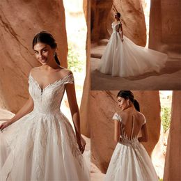 Glitter A-line Wedding Dresses Sexy Jewel Sleeveless Appliqued Lace Sequins Bridal Gowns Illusion Sweep Train Robes De Mariée Custom Made