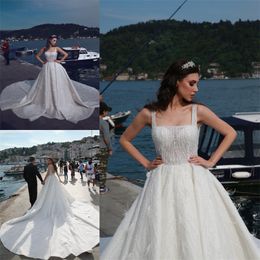hot sell bridal dresses spaghtti strap sleeveless appliqued sequins beads feather wedding gown sexy backless custom made robes de marie