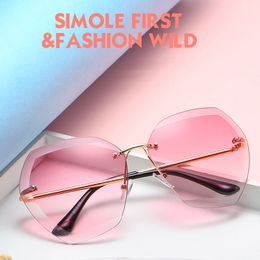 Luxury- Fashion Sexy Rimless Oversized UV400 Sunglasses for Women Metal Frame Sun Glasses Pink Blue Plastic UV400 Shades Designers Eyewear