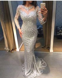 2019 Saudi Arabic Sliver Long Sleeves Evening Dress Sheath Crystal Formal Holiday Wear Prom Party Gown Custom Made Plus Size