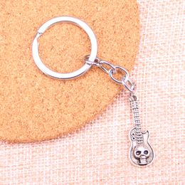 New Keychain 32*11mm guitar skull Pendants DIY Men Car Key Chain Ring Holder Keyring Souvenir Jewelry Gift