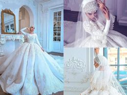 Dubai Muslim Luxury Lace Ball Gown Wedding Dresses Chapel Train Full Beads Applique Long Sleeve Wedding Dress African Plus Size Bridal Gowns