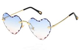 -{Made in China} Novo amor cortar-borda óculos de sol pêssego óculos de sol da cor do oceano sem armação óculos frete grátis 10pcs / lot 9color.