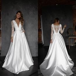 Setwell Deep V-neck A-line Wedding Dresses Long Sleeves Lace Appliques Pleated Satin Sexy Back Floor Length Bridal Gowns With Pockets