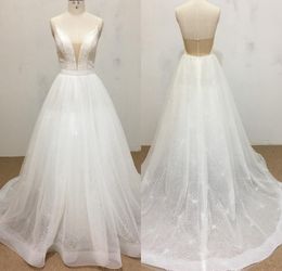 Bohemian A Line Luxury Wedding Dresses Tulle Lace Applique Sequins Pears Beads Formal Dress Spaghetti Sleeveless Backless Sweep Train Bridal