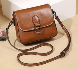 Designer-New genuine leather bag with cowhide, fashionable small side bag with moisture and one shoulder slanting bag for ladies