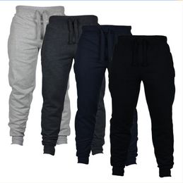 Pantaloni da jogging a 4 colori Pantaloni skinny da uomo di nuova moda Pantaloni lunghi Tinta unita Pantaloni da corsa per esterni Pantaloni casual da ragazzo