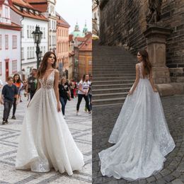 2020 Beach A-line Wedding Dresses Full Appliqued Lace V-neck Sleeveless Boho Bridal Gowns Backless Sweep Train Robes De Mariée Cheap