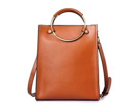 Designer- Stylish women's bag 2018. Leather and metal shoulder and handbag