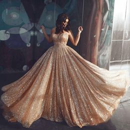 2019 Cheap Sexy Blingbling Gold Sequined Lace Prom Dresses Spaghetti Straps Backless Sweep Train Ball Gown Formal Evening Party Gowns Wear
