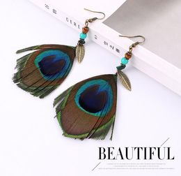 Bohemian ethnic peacock feather earrings long retro beaded beach earrings WY488