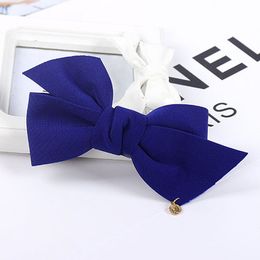 Faddish trend korean style women cute elegant hair clip wholesale china supplier bow hair accessories custom