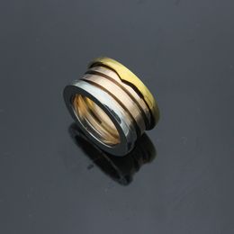 Wholesale-316L titanium steel plated rose gold gear ring for couples spring ring jewelry