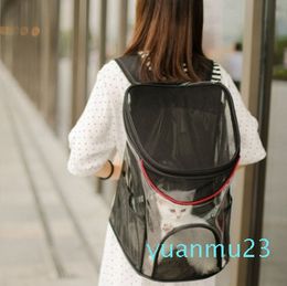Designer-New pet outing bag for dogs and cats portable breathable backpack for pets Transparent bag for pets outing bag