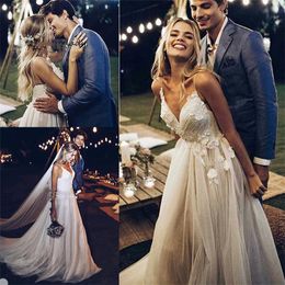 beach aline wedding dresses spaghetti strap sleeveless appliqued lace wedding gown cheap boho sweep train custom made robes de marie