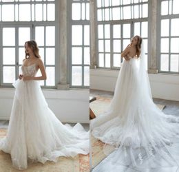 2020 Sexy Doria Karlozi Wedding Dresses Spaghetti Strap Sleeveless Beads Pearls Bride Dress A Line Sweep Train Tulle Abiti Da Sposa