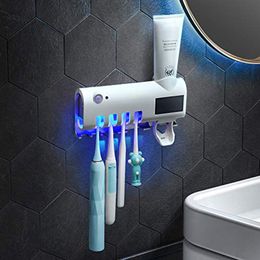 wholesale UV Toothbrush Steriliser Rechargeable Solar Power LED Disinfection Wall Mounted Toothbrush Holder Automatic toothpaste extrusion