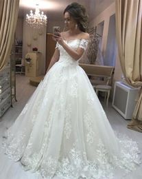 2020 New Elegant Ivory A Line Wedding Dresses Off Shoulder Full Lace Appliques Beaded Sweep Train Puffy Plus Size Bridal Gowns Arabic Dubai