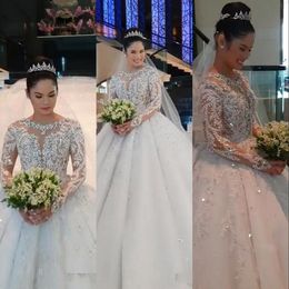 Sexy Arabic Luxury Ball Gown Wedding Dresses Lace Appliques Long Sleeves Puffy Jewel Neck Sequins Beaded Cathedral Train Formal Bridal Gowns