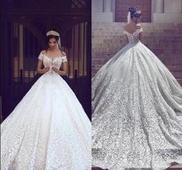 2017 Saudi Arabic Dubai Luxury Short Sleeves Wedding Dresses Off Shoulder Appliques Backless with Sweep Train Bridal Gowns Robe de marriage