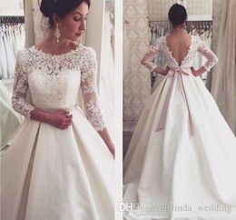 2019 Dubai Arabic 3/4 Long Sleeves Wedding Dress A Line Lace Appliques Backless Country Garden Bride Bridal Gown Custom Made Plus Size