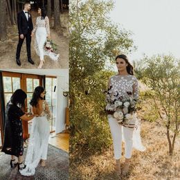 holiday pant suits UK - Boho Country Wedding Jumpsuit With Train 2020 Jewel Neck Long Sleeve Lace Floral Backless Summer Holiday Beach Bride Pant Suit