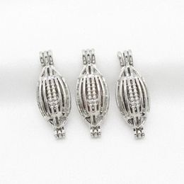 10pcs Silver Rugby Football Pearl Cage Essential Oil Diffuser Lava Bead Locket Pendants for Perfume Aromatherapy Necklace Making