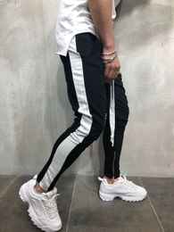 Pantaloni da uomo Pantaloni sportivi da uomo con tasche larghe a righe casual 2021 Pantaloni da jogging larghi con lacci maschili