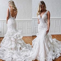 Plus Size African Sexy Mermaid Wedding Dresses Deep V Neck Backless Lace Applique robes de mariée Tiered Organza Wedding Dress Bridal Gowns