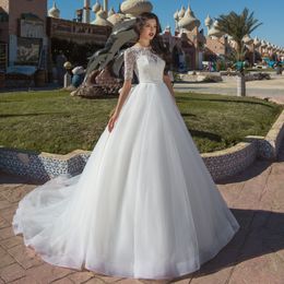 Amazing A Line Beaded Wedding Dresses Sheer Bateau Neck Short Sleeves Beaded Bridal Gowns Tulle Sweep Train robe de mariée