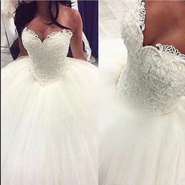 Gorgeous Pearls Ball Gown 2016 Wedding Dresses Sexy Sweetheart Sleeveless Lace Applique Beads Tulle Saudi Arabia Bridal Gowns Princess