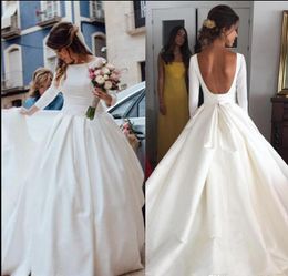 Simple Cheap Wedding Dresses bateau 2019 New Fashion Satin A Line Long Sleeves Backless Wedding Dress robe de mariée Sexy Bridal Gowns