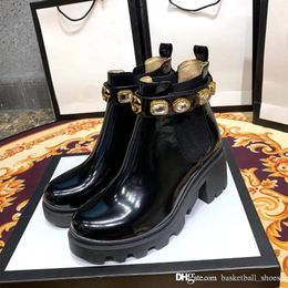 botas gucci serpiente en la suela