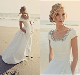 Cheap A Line Wedding Dresses Scoop Neck Short Sleeves Beads Crystal Beach Bohemian Pockets Long Vestidos Custom Plus Size Bridal Gowns