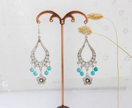 new hot Popular restore ancient ways hyperbole turquoise flower tassel earring Bohemian earring individual character vogue is classic and de