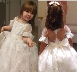 Elegant White Poet Short Sleeve Flower Girl Dresses Princess A Line Crew Neck Sheer Back Appliques Kids Formal Pagenat Gowns With Bow Sash