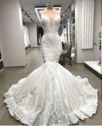 Einzigartige Spitzen-Meerjungfrau-Hochzeitskleider der Spitzenklasse, Applikationen, Dubai, Perlen-Brautkleider nach Maß, Robe De Mariee
