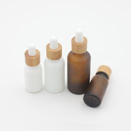 Frasco conta-gotas de vidro branco âmbar fosco 15ml 30ml 50ml com tampa de bambu 1oz Frascos de óleo essencial de madeira