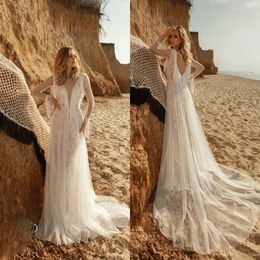 bohemian long sleeve tassel wedding dresses lace appliqued sheer v neck bridal gown boho a line wedding dress robes de marie