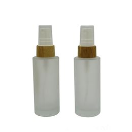 50ml Frost Glass Bottle with Wood Lotion Pump Bamboo Spray Nozzle Cosmetic Essence Toner Packaging Bottle F3083