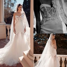 Boho A-line Wedding Dresses Sexy Spaghetti Strap Sleeveless Appliqued Lace Beaded Bridal Gown Backless Sweep Train Beach Robes De Mariée