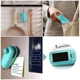 2 in1 Mini Portable Handheld Heat Sealer Useful Blue Plastic Sealing Bag Cutter Resealer Heat Sealing Machine Vacuum Packing Featured